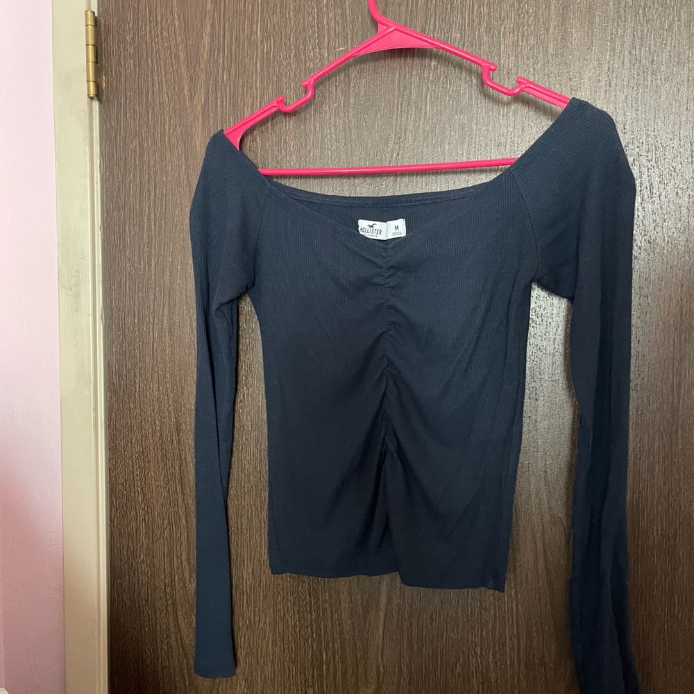 Hollister size medium, long sleeve, navy blue shirt. Ruche detail.